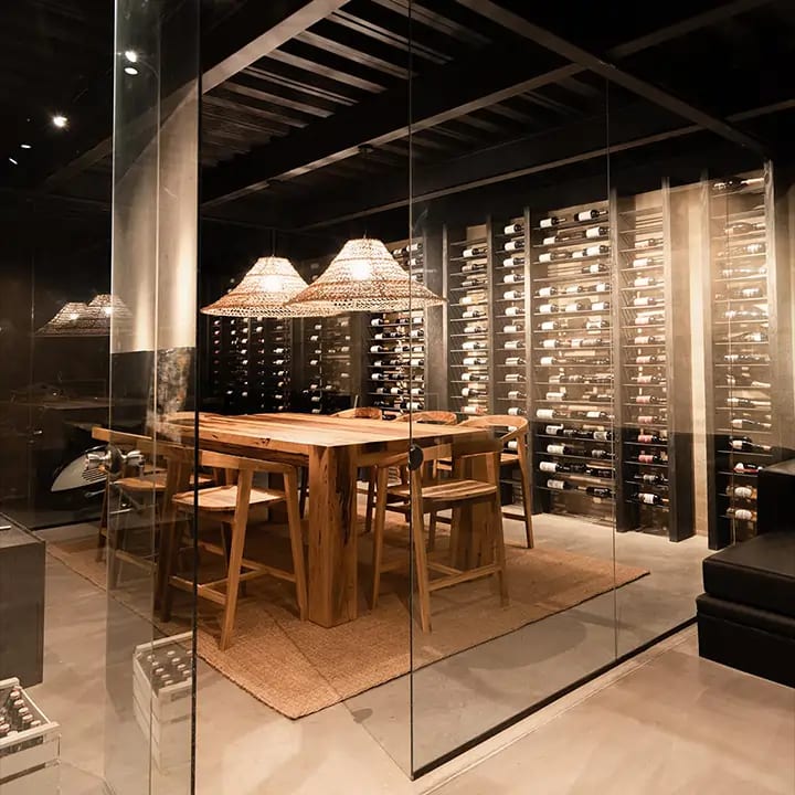 Glass-enclosed wine room signature feature in custom home in Bloomfield Hills Michigan
