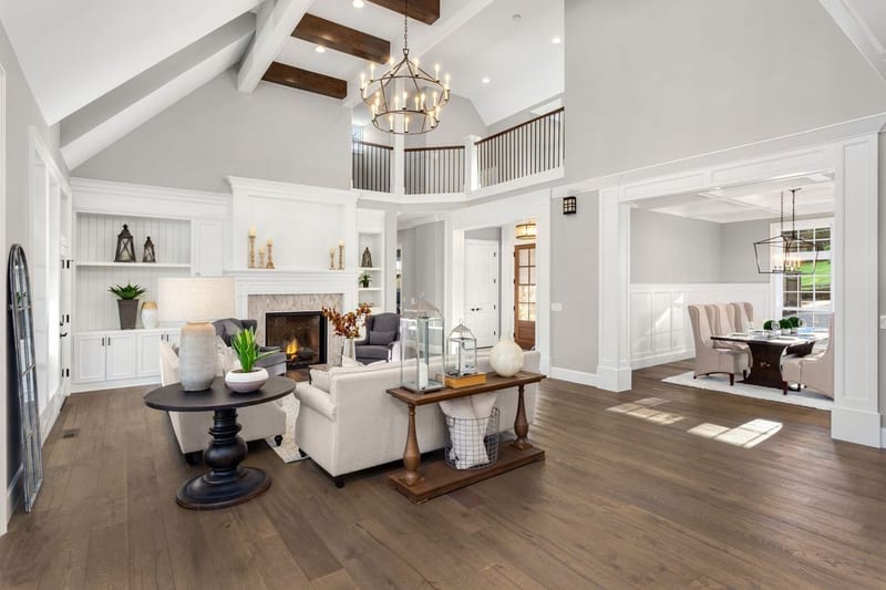 Whole home remodel living room with chandelier by Reschka Design Build in Oakland County Michigan