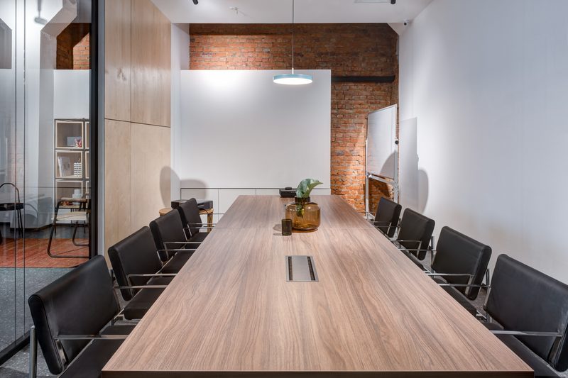 Brickworks + Loft conference room design by Reschka Design Build