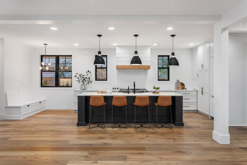 Lakeside + Addition modern kitchen with pendant lights by Reschka Design Build