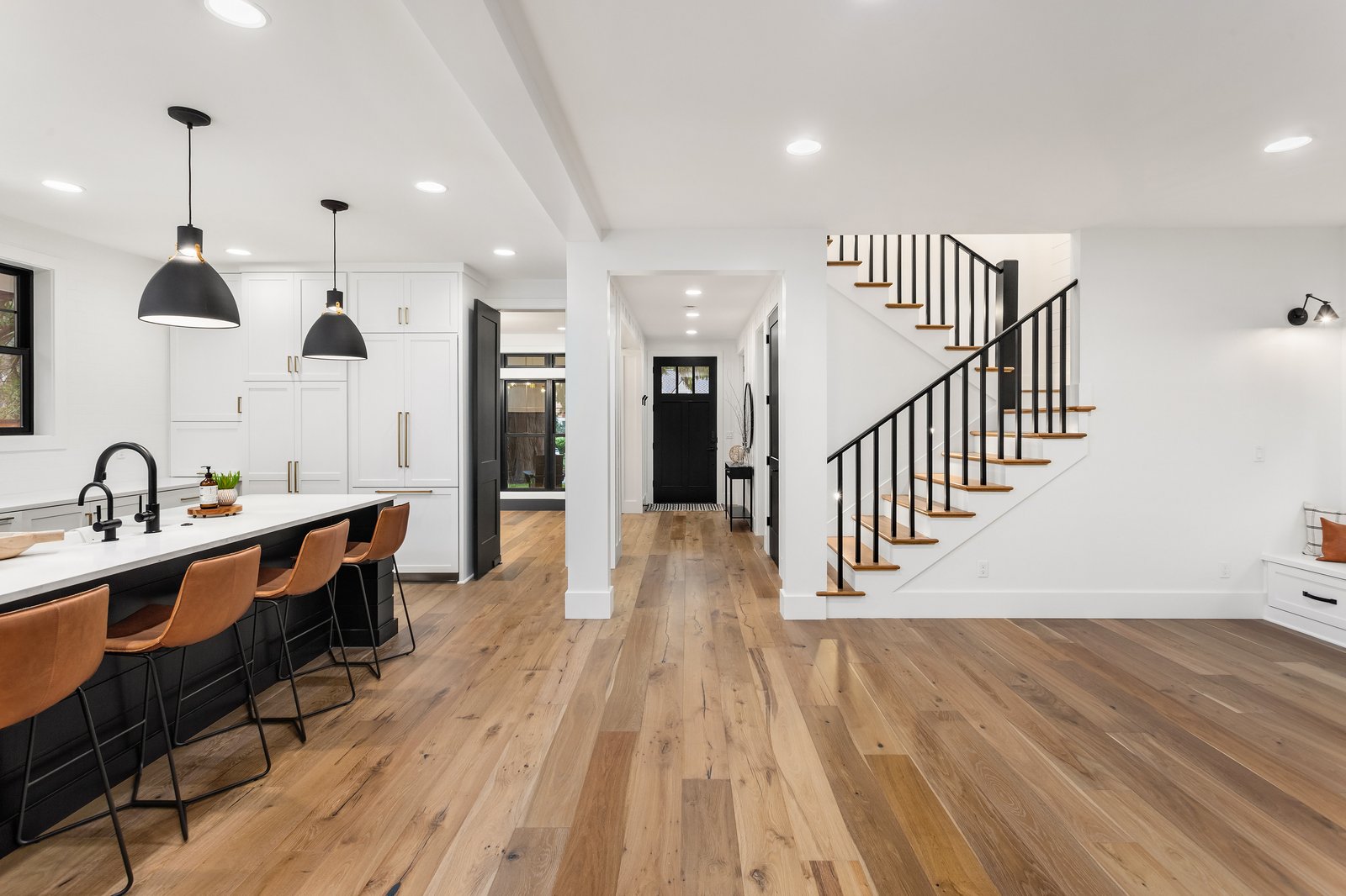 Lakeside + Addition open concept living room by Reschka Design Build