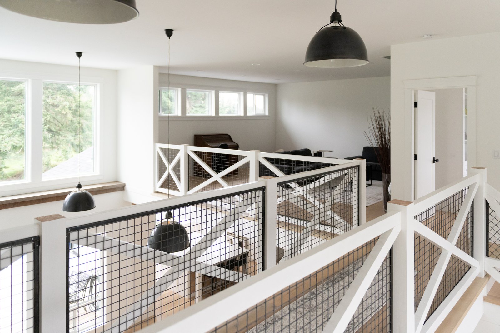 Willow Ridge + Estate upstairs loft area by Reschka Design Build